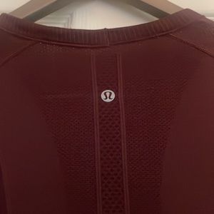 Women’s Lululemon Swiftly Tech Long Sleeve Maroon. I believe it is a size 8